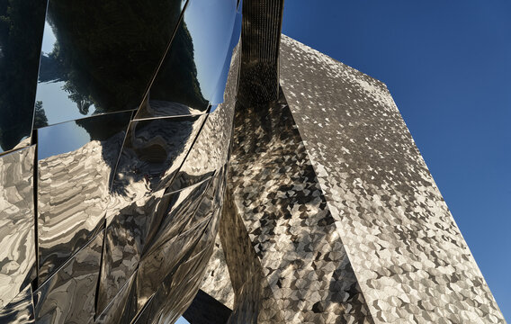 PARIS, FRANCE &ndash; May 15, 2026: Wide-angle architectural view of the Philharmonie de Paris designed by Jean Nouvel, featuring reflective metallic cladding, intricate geometric patterns, contemporary cul