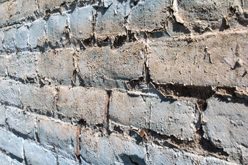 Fototapeta premium Gritty urban brick building exterior background