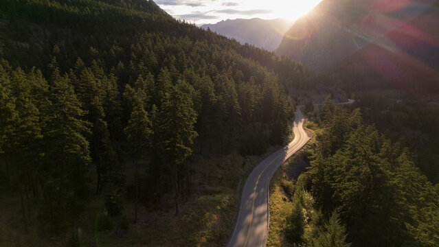 Winding road through green hills in a mountain landscape