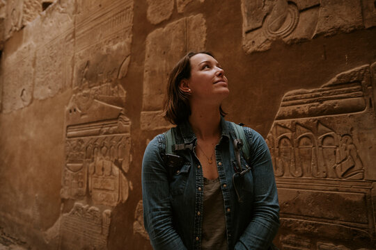 Exploring ancient ruins in Egypt's desert landscape during daylight