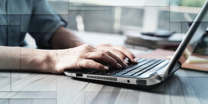 Female hands using a laptop, geometric pattern