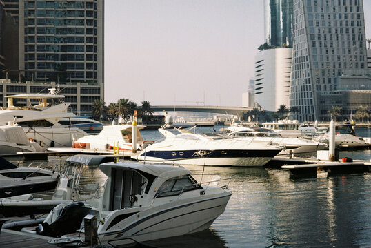 Film Photo of Luxury Yachts at Dubai Marina with Skyscrapers