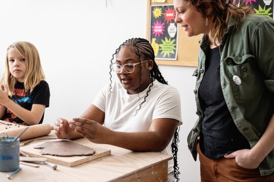 Young Student Learning Clay Sculpting in Art Class Workshop