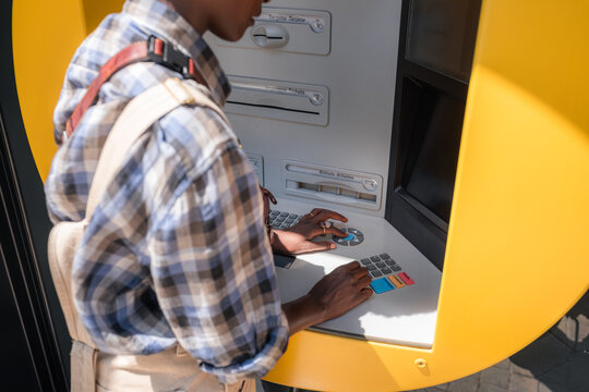 Person Using an ATM keyboard
