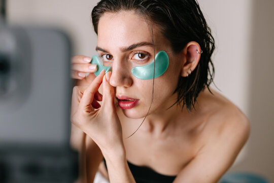Woman with eye patches 