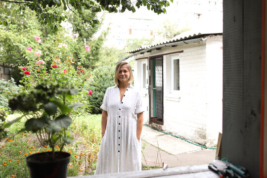 women in dress in the yard