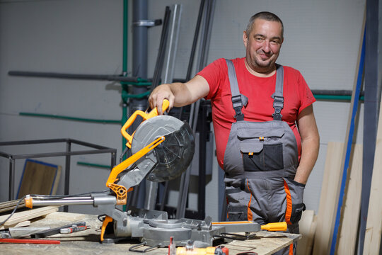 Portrait of a jack of all trades in his workshop