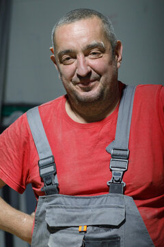 Portrait of a carpenter in his workshop