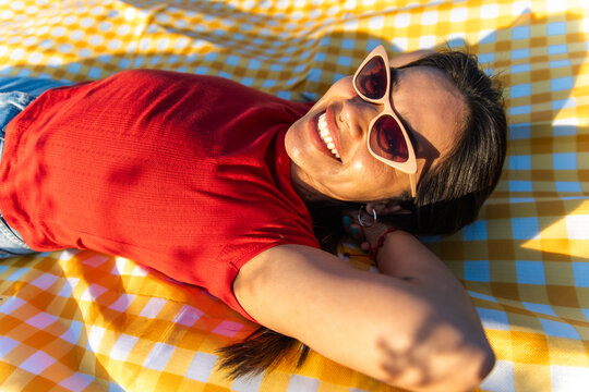 Relax Happy woman lays picnic 