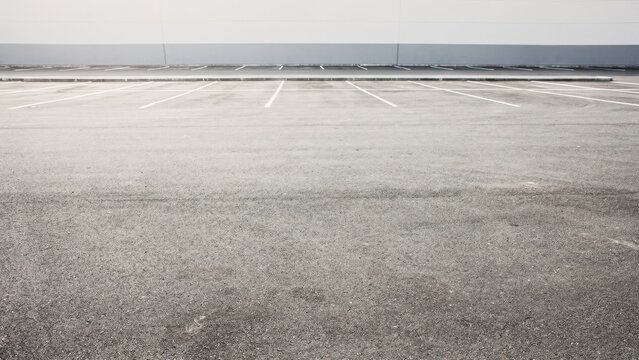 Empty Parking Lot with Concrete Pavement