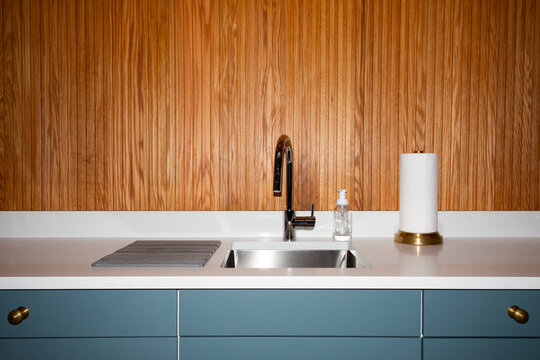 Vertical wood Paneling modern sink  kitchen 