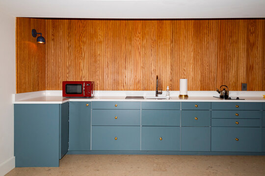 Vertical wood Paneling modern  kitchen microwave  nobody