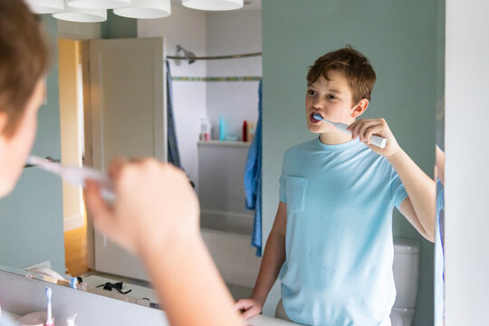 Portrait Teenager alone Lifestyle brush teeth mirror 