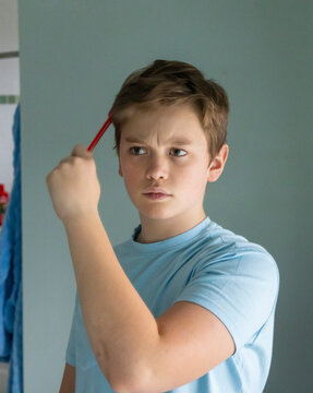 Teen boy Portrait Lifestyle comb Hair look Mirror bathroom 