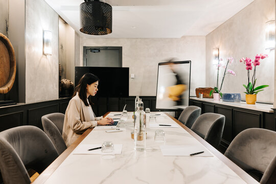 Working In Meeting Room