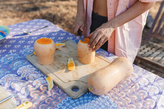 Preparing butternut squash for healthy outdoor cooking