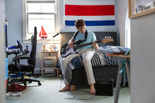  Teenager  electric bass Musician  bedroom 