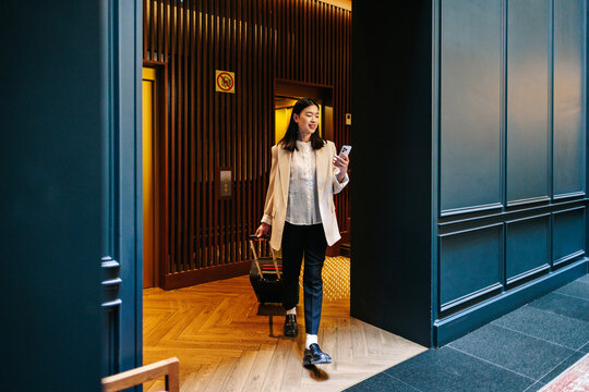 Leaving Hotel With Luggage