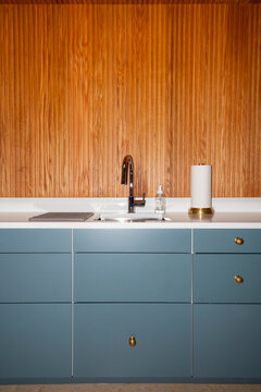 Vertical wood Paneling modern  kitchen counter nobody
