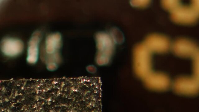 Microscope Macro Close-up Shot of Microchip, CPU Processor on Printed Circuit Board, Computer Motherboard with Components Inside of Electronic Device, Part of Supercomputer microscop.