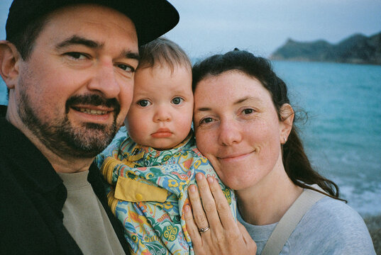 Self portrait of young family in the evening