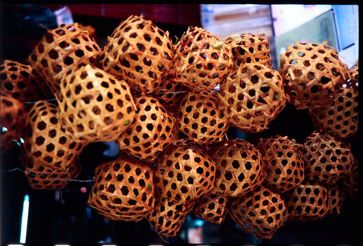Woven Baskets Displayed in a Market in Asia
