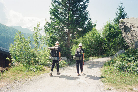 group hikers heading down the mountain in the Alps , France