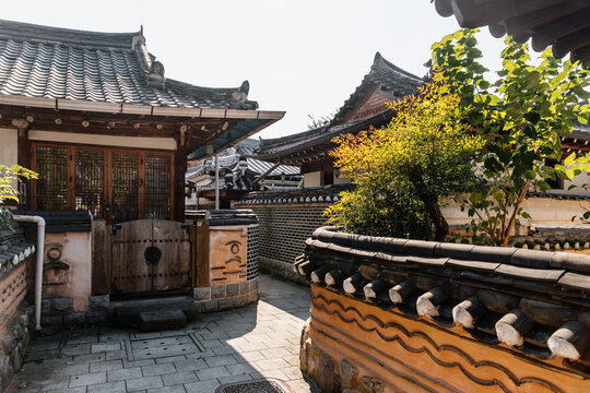 Traditional Korean hanok courtyard with wooden house and garden