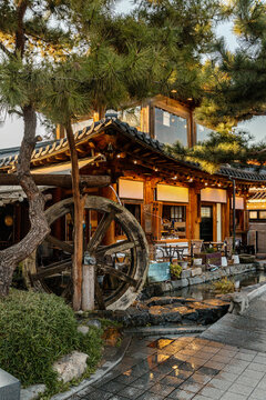 Traditional house with wooden water wheel in Jeonju