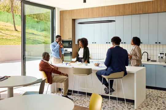 Corporate people spend time in a canteen