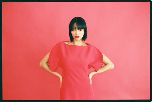 Woman in red dress with bob haircut