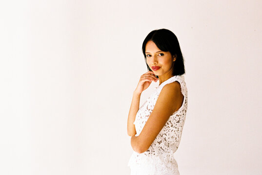 Woman in white lace top