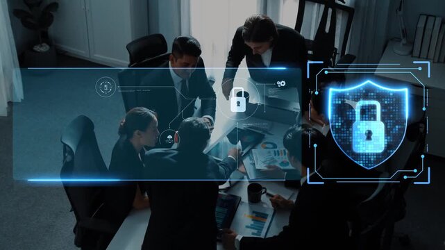 A business team collaborates on a cybersecurity strategy in a modern office. Digital visuals emphasize security, protection, and teamwork in a professional setting. Raster
