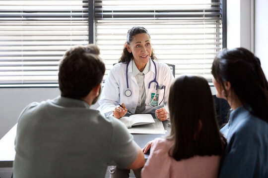 Doctor Speaks With Family in Hospital Setting