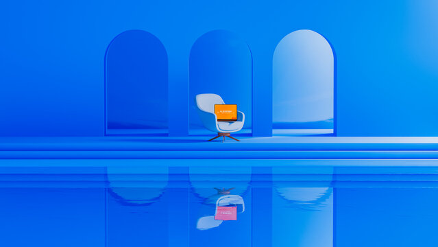 Modern blue interior with chair and laptop setup for work