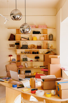 Small Business Store Office with Laptop and Packaging Supplies