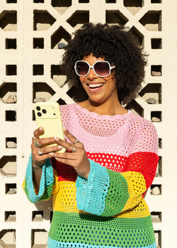 Black woman Fashion smile Portrait cell phone texture wall