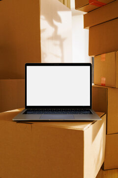 Laptop Mockup White screen Ecommerce Orders Cardboard Boxes