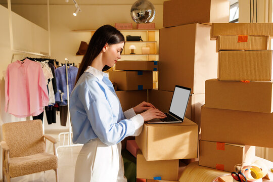 Woman laptop mockup with blank screen in small business