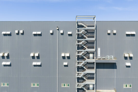 Gray Logistics Warehouse with External Staircase