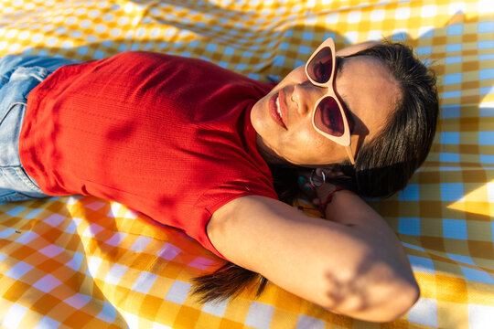 Relax Happy woman lays picnic 