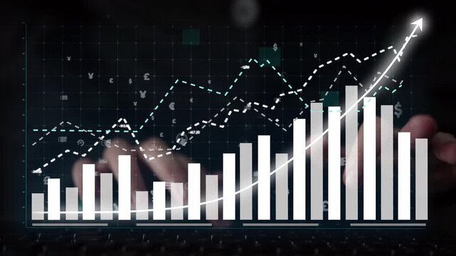 Close-up of hands on a keyboard with a graph and financial data overlay, symbolizing business growth, investment success, and digital analysis in a modern workspace. Copula