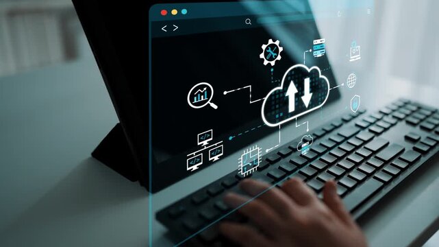 Hands typing on a keyboard with digital cloud graphics and technology icons floating above, illustrating concepts of data transfer, networking, and innovation. Entropy.