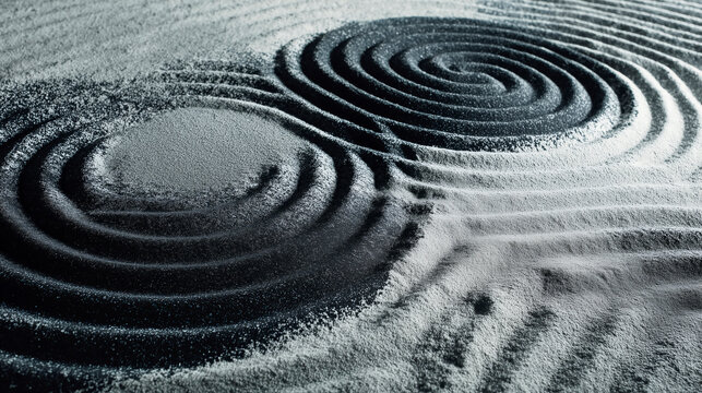 Black and White Sand Raked into Swirling Zen Garden Patterns