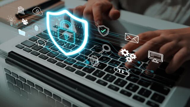 Digital Security and Protection Concept with Shield Icon Overlaying Laptop Keyboard Representing Online Safety and Data Privacy. Entropy.