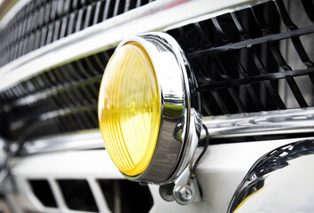 Car light at a car show © Jonathan