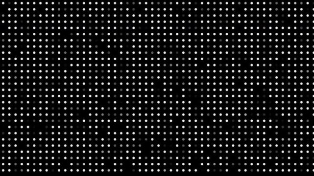 Black background with small white dots forming a pattern texture