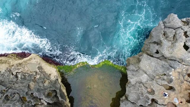 Aerial top down view of angel's billabong natural pool in nusa penida
