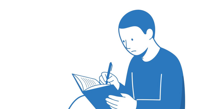 Man writing in a notebook.