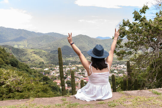 Woman Sitting at Mirador Overlooking Malinalco Valley